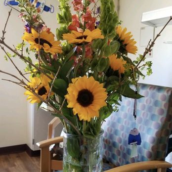 Linnea & Kristine - Gorgeous sunflowers bouquet with Irish bells and pop of blue and red. - Florists Near Me - Iron Mountain, Michigan Linnea & Kristine - Gorgeous sunflowers bouquet with Irish bells and pop of blue and red. - Florists Near Me - Iron Mountain, Michigan