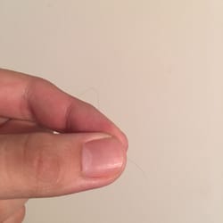 McDonald's - The hair that was in my Southwest Salad for the second time. I don't have curvy hair.