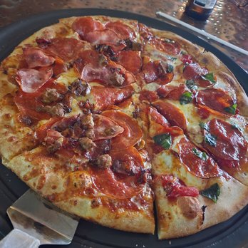 Two Cities Pizza Company - Half meat and half Margherita pizza - Pizza Near Me - Mason, Ohio Two Cities Pizza Company - Half meat and half Margherita pizza - Pizza Near Me - Mason, Ohio
