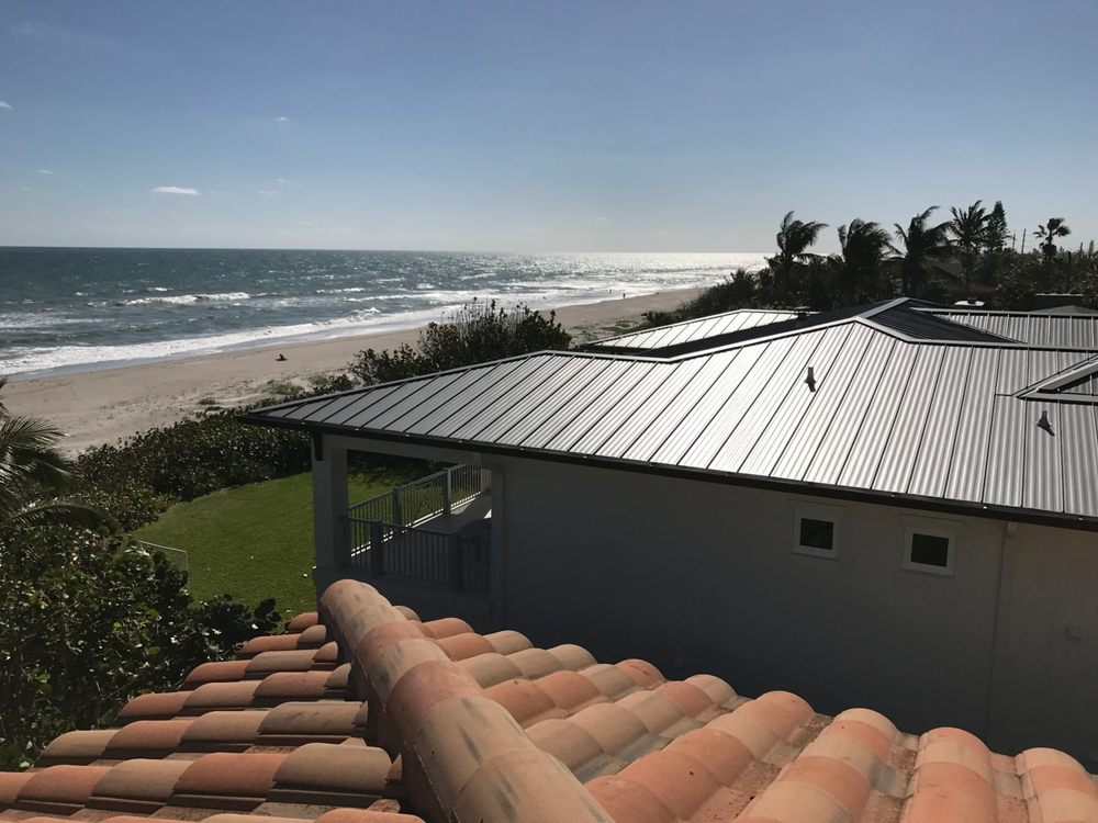 Slide of JVR Roofing