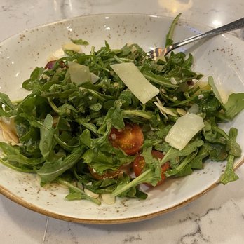 Seventy Six - Perfectly dressed garden salad. Arugula, heirloom tomatoes, almonds and shaved Parmesan. - New American Near Me - Holland, Michigan Seventy Six - Perfectly dressed garden salad. Arugula, heirloom tomatoes, almonds and shaved Parmesan. - New American Near Me - Holland, Michigan