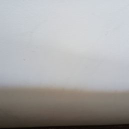 Filthy wall next to bed Filthy wall next to bed