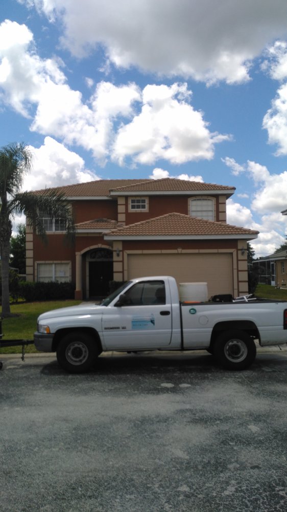 Slide of Champions Gate Pressure Washing & Roof Cleaning