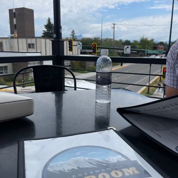 Bozeman Taproom & Spirits - a man sitting at a table - Beer Bar Near Me - Bozeman, Montana