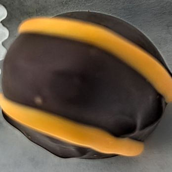 South Bend Chocolate Cafe - Orange Dark Chocolate Truffle at South Bend Chocolate Cafe - Chocolatiers & Shops Near Me - South Bend, Indiana South Bend Chocolate Cafe - Orange Dark Chocolate Truffle at South Bend Chocolate Cafe - Chocolatiers & Shops Near Me - South Bend, Indiana