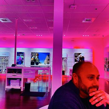 T-Mobile - This place is so disco groovy la vie en rose OuiOui. Hahahaha hahaha - Mobile Phones Near Me - Pensacola, Florida