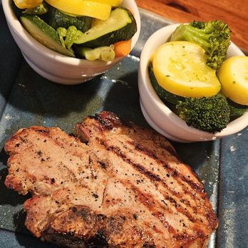 River House Bar and Grill - 10 oz grilled pork chop plate - New American Near Me - Moline, Illinois River House Bar and Grill - 10 oz grilled pork chop plate - New American Near Me - Moline, Illinois