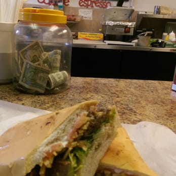 Erika's Cafe & Restaurant - a sandwich cut in half - Coffee & Tea Near Me - Davie, Florida Erika's Cafe & Restaurant - a sandwich cut in half - Coffee & Tea Near Me - Davie, Florida
