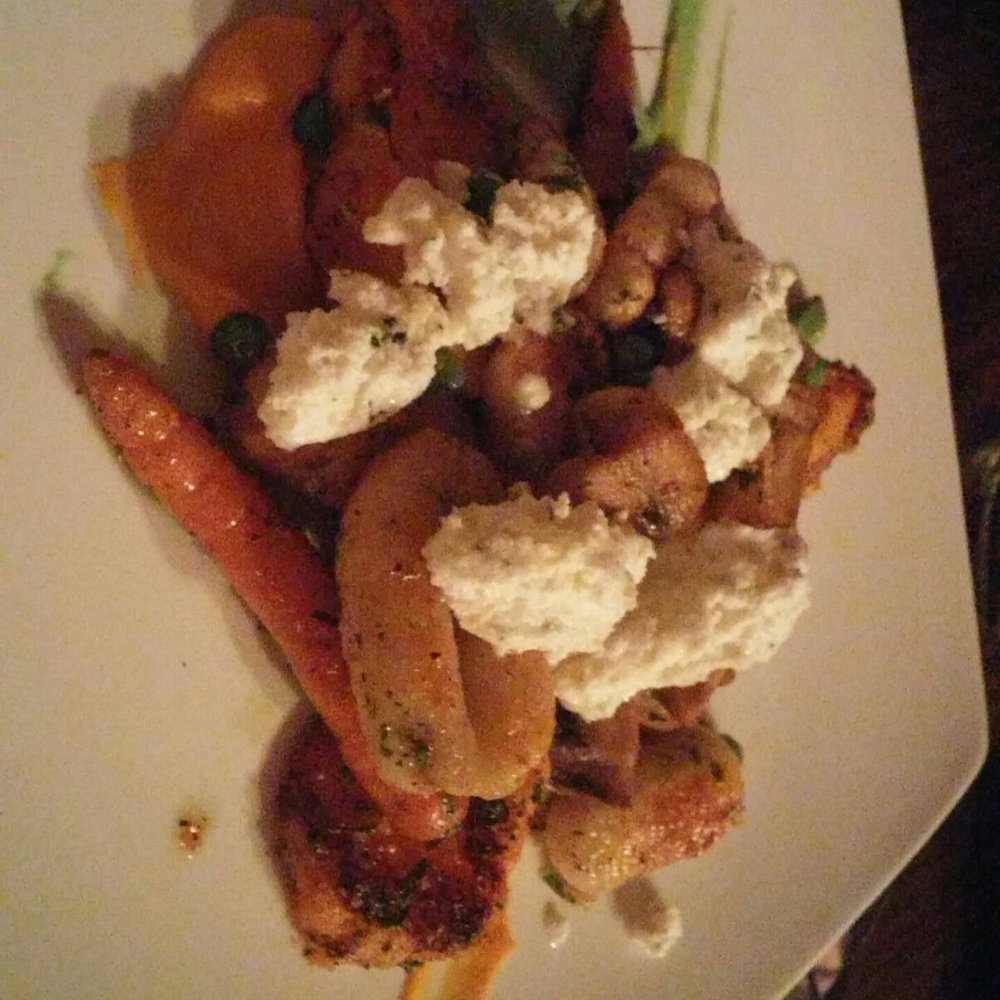 The Woods - a plate of food on a table - American Near Me - Kelowna, British Columbia The Woods - a plate of food on a table - American Near Me - Kelowna, British Columbia