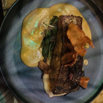 ATX Cocina - Salmon dish on yuca purée and carrot chips - slightly spicy - Mexican Near Me - Austin, Texas