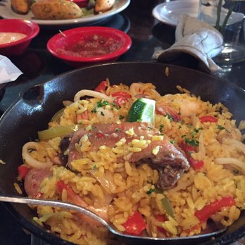 E B Latin Bistro - Paella for one plus empanadas in the back - Cuban Near Me - Plano, Texas