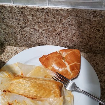 NaVis Bakery - I took it home...and it was da bomb. Pineapple empanada on top, the carnitas tamale...just heaven on earth!!! - Bakeries Near Me - Rosemead, California