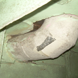 Corwin Inspections - Asbestos duct Wrap in Basement