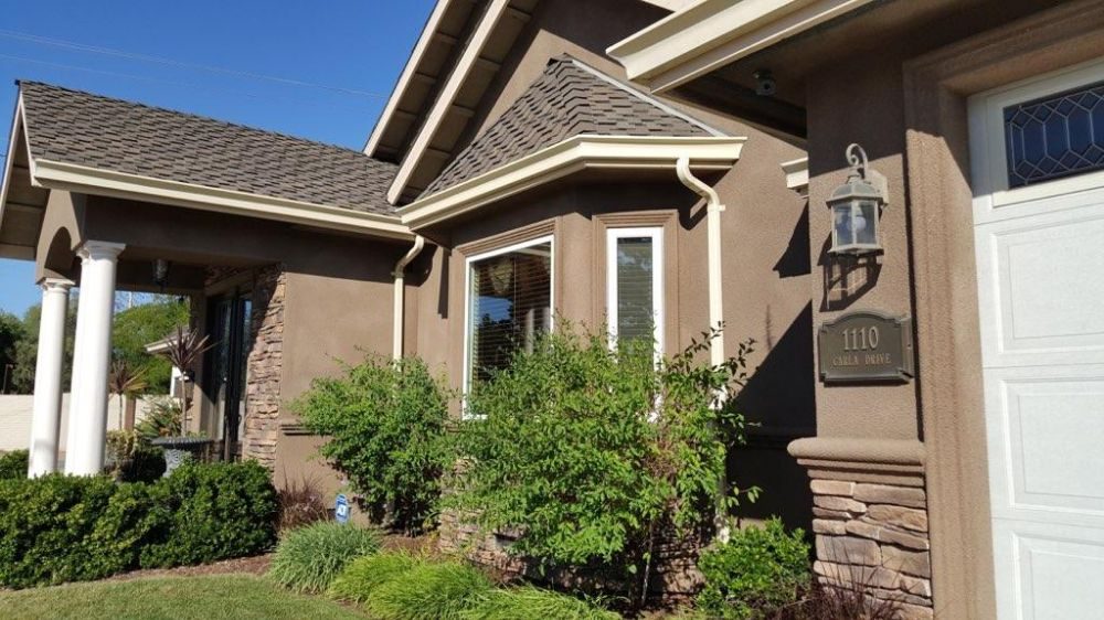 Slide of Lanuza Roofing