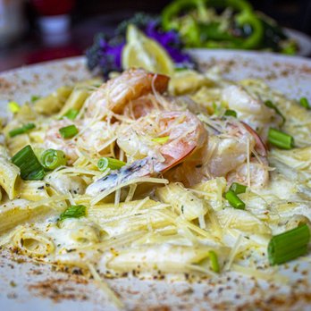 The Thirsty Marlin - a plate of pasta with shrimp - New American Near Me - Palm Harbor, Florida The Thirsty Marlin - a plate of pasta with shrimp - New American Near Me - Palm Harbor, Florida