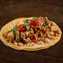Arbol Spiced Chicken Chorizo, chipotle aioli, chili lime chicken chicharron, cilantro, candied fresno chiles