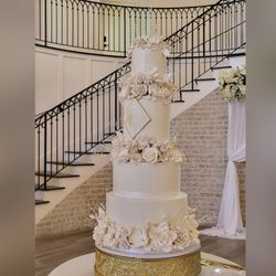 Elegant Buttercream Wedding Cake with edible sugar flowers