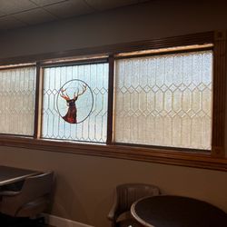 Handy Firefighter Construction - Window at Roseville Elk's Lodge customer wanted it cut out and framed for a door.
