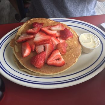 The Brothers Cafe - Banana pancakes with strawberry on top - Breakfast & Brunch Near Me - Sunnyside, New York