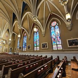 Basilica of Saint Andrew - The stained glass windows and pews of the Basilica of Saint Andrew.