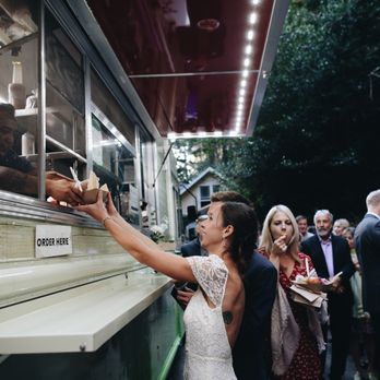South Fork Services & Events - a bride reaching out of a food truck - Food Trucks Near Me South Fork Services & Events - a bride reaching out of a food truck - Food Trucks Near Me