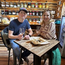 a man and a woman sitting at a table