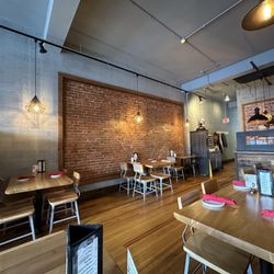 Prai Kitchen - The interior is spacious and despite the wood and brick, not very loud.