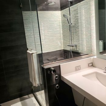American Airlines Flagship Lounge - Private shower area with a Dyson hair dryer - Airport Lounges Near Me - Chicago, Illinois