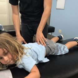 Seal Beach Chiropractic Center - Dr. Josh checking out my son Micah....super gentle and patient.