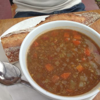 Bread Lounge - Bowl of curry lentil soup with half a piece of yummy bread - Bakeries Near Me - Los Angeles, California Bread Lounge - Bowl of curry lentil soup with half a piece of yummy bread - Bakeries Near Me - Los Angeles, California