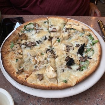 Flat River Grill - Mushroom pizza with gluten free crust - New American Near Me - Lowell, Michigan