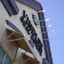 Spot on Signs and Graphics - Halo-lit channel letters with a custom signbox for the logo.