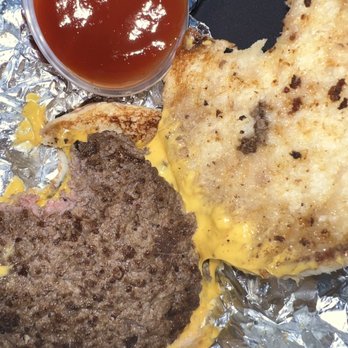 Five Guys - a hamburger and a half eaten sandwich - Fast Food Near Me - Tampa, Florida