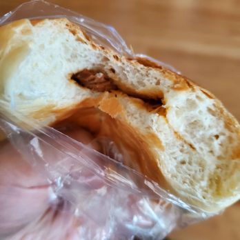 Koko Bakery - a half eaten sandwich wrapped in plastic - Bakeries Near Me - Cleveland, Ohio