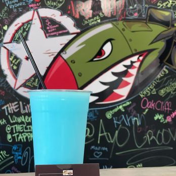 Atomic Daiquiris Spring - a blue cup with a straw - Drive-Thru Bars Near Me - Spring, Texas