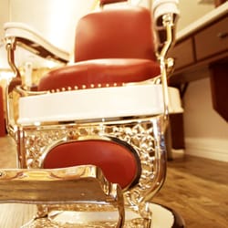 The Blade Barbershop - Get your next haircut in one of our antique barber chairs