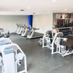 Chenoa Fitness Center - Some weight machines and cardio machines.