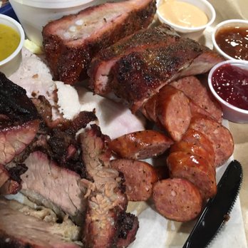 Serious Texas BAR-B-Q - Close up Of meats and sauces. - Barbeque Near Me - Durango, Colorado Serious Texas BAR-B-Q - Close up Of meats and sauces. - Barbeque Near Me - Durango, Colorado