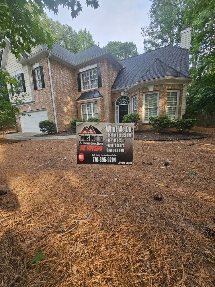 Slide of Twins Roofing & Construction