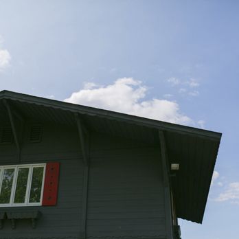 Carr Valley Cheese - red shutters on a gray house - Cheese Shops Near Me - Mauston, Wisconsin