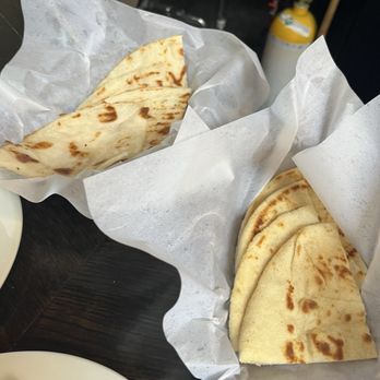 Troy Greek Cuisine - Gluten free pita on left, regular pita on right - Greek Near Me - Berkeley, California