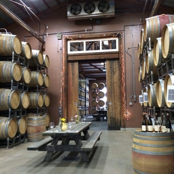 Saintsbury - Tasting in the barn. Entrance to the barrel room. - Wineries Near Me - Napa, California Saintsbury - Tasting in the barn. Entrance to the barrel room. - Wineries Near Me - Napa, California
