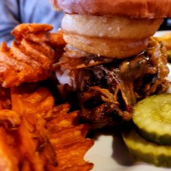 Brooks Place Tavern - The Big Pig - pulled pork, barbecue sauce, jalapeno, melted cheddar, onion rings and coleslaw with pickles and your choice of side