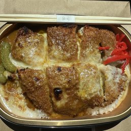 Baked Curry Katsu Don カレーカツ丼のオーブン焼き $16.95. Not your typical takeout container Baked Curry Katsu Don カレーカツ丼のオーブン焼き $16.95. Not your typical takeout container