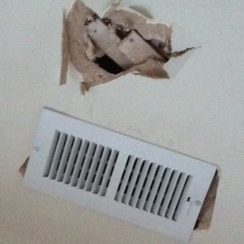 Michael & Son Services - A register on our guestroom ceiling, with a random hole next to it that they left unexplained and unrepaired. - Plumbing Near Me - Alexandria, Virginia Michael & Son Services - A register on our guestroom ceiling, with a random hole next to it that they left unexplained and unrepaired. - Plumbing Near Me - Alexandria, Virginia