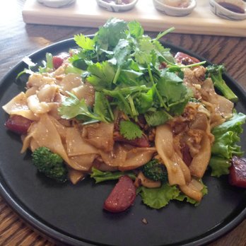 Bangkok Bistro - Pad See Ew. (Sp) With Chinese sweet Sausage. Cilantro and green onion garnish at my request. - Thai Near Me - Fort Wayne, Indiana Bangkok Bistro - Pad See Ew. (Sp) With Chinese sweet Sausage. Cilantro and green onion garnish at my request. - Thai Near Me - Fort Wayne, Indiana