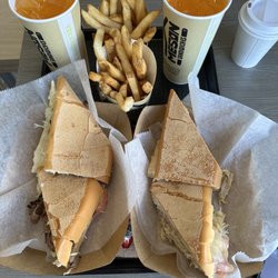 El Meson Sandwiches - El Caribe & Pastrami with French fries and Passion Fruit juice