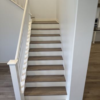 Empire Luxury Flooring - White visors with vinyl planks flooring - Flooring Near Me Empire Luxury Flooring - White visors with vinyl planks flooring - Flooring Near Me