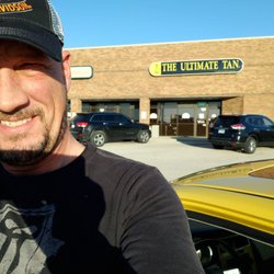 The Ultimate Tan - Parking lot
