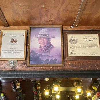 Slash X Ranch Cafe - At the entrance, homage to The Duke - American Near Me - Barstow, California